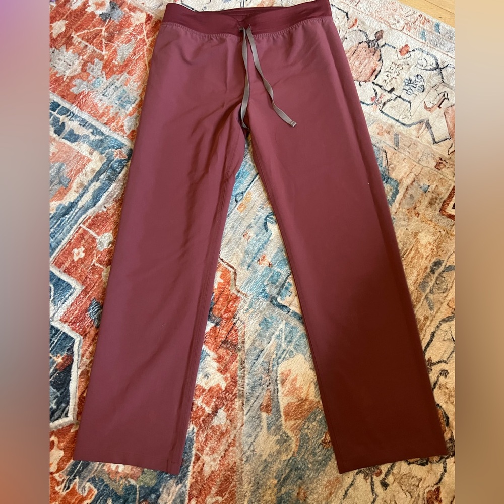 Figs Women’s Livingston scrub pants in Dark Cherry.
